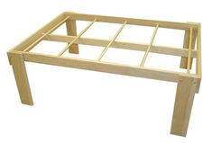 a wooden bed frame with no headboard and legs on the bottom side, in front of a white background