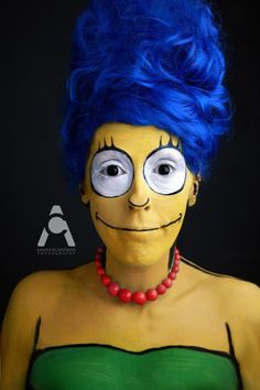 a woman with blue hair and face painted to look like the simpsons character from the simpsons