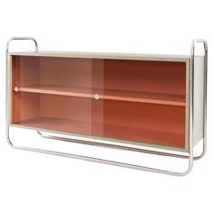 a metal shelf with two shelves on each side