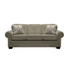 a gray couch with two pillows on it