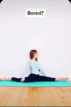 a woman is sitting on a yoga mat with the words bored written in front of her