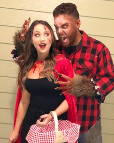 a man and woman dressed up as zombies