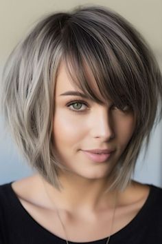 An asymmetrical bob with angled waterfall bangs is a trendy and versatile hairstyle that suits both straight and wavy hair. The angled bangs add a touch of flair to this cut. Click here to check out more waterfall fringe bangs hair ideas. Trendy Bob Hairstyles With Bangs, Long Layered Bobs For Thick Hair, Short Assymetrical Hair With Bangs, Asymmetric Bob With Bangs, Short Edgy Haircuts With Bangs, Asymmetrical Bob With Fringe, Aline Bob With Side Bangs, Asymmetrical Bob Bangs, Short Bob With Bangs For Thick Hair