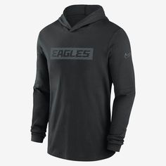 As a versatile layer for game day, the Philadelphia Eagles Sideline Top combines sweat-wicking technology with lightweight, stretchy fabric and a French terry lining for ultimate comfort. Its removable sleeve seams provide the option of a short-sleeve style. Nike Technical Long Sleeve Hoodie, Nike Functional Sweatshirt For Sports Events, Nike Technical Hoodie, Nike Functional Sweatshirt For Sports, Technical Long Sleeve Hoodie For Sports Season, Black Sports Hoodie With Team Name, Sports Team Hoodie In Black, Nike Functional Hoodie For Sports Events, Black Sports Hoodie With Team Spirit