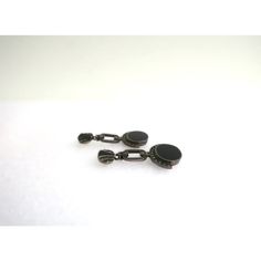 This is part of Chairish’s Fine Jewelry assortment.  A beautiful pair of black onyx and sterling silver Art Deco style dangle earrings, circa mid to late-20th century. A great pair to dress up or down. Each are marked on back 'Sterling' as shown in last three images. Excellent condition as shown in images. No issues. Dimensions: 1.5" Long. Classic Sterling Silver Earrings With Black Enamel, Classic Black Enamel Sterling Silver Earrings, Elegant Onyx Earrings With Polished Finish, Black Enamel Onyx Drop Earrings, Sterling Silver Jewelry With Black Enamel For Formal Occasions, Black Polished Evening Earrings, Formal Sterling Silver Jewelry With Black Enamel, Onyx Drop Earrings With Black Enamel, Black Polished Finish Earrings For Evening