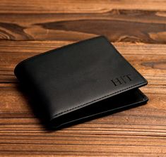 These genuine cowhide leather wallets are beautifully stitched together and permanently laser marked with any wording, name or logo that you'd like. The leather smells and feels fantastic. Great care is taken to create the highest quality engravings with a good depth and a deep black contrast so they your wording will remain on your wallet for the lifetime of the wallet Personalized Leather Wallet, Engraved Wallet, Anniversary Gift For Him, Custom Wallet, Branded Wallets, Mens Wallet, Personalized Wallet, Black Leather Wallet, Clip Wallet