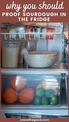 an open refrigerator filled with lots of fruit and vegetables next to bowls, cups, and utensils