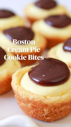 small cupcakes with chocolate frosting sitting on a plate