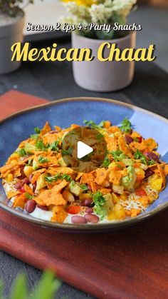 mexican chaat is served on a blue plate