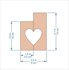 an image of a heart cut out on a piece of cardboard with measurements for it