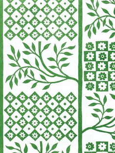 two green and white quilts with flowers on them