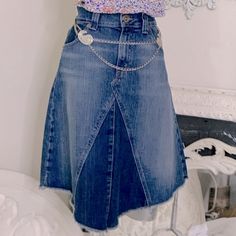 Levi’s Jeans Distressed Stretch Frayed Denim Skirt Classic Five-Pocket Styling Raw Edge Hem Hangs Lower In The Front Zip Fly With Button Closure The Vibe Is Cottagecore Western Prairie Farm Boho “Shabby Chic” Country Fancy French Bohemian Girly Vintage Kitchen Crop Urban Cottage, Traditional Country Cook Shack Pretty Cutoff Denim Skirt With Pockets, Levi's Denim Skirt With Pockets For Spring, Levi's Casual Denim Skirt With Pockets, Light Wash Cutoff Skirt With Pockets, Vintage Denim Blue Skirt With Frayed Hem, Blue Cutoff Denim Skirt With Pockets, Levi's Denim Blue Bottoms With Frayed Hem, Fitted Levi's Denim Skirt With Pockets, Levi's Fitted Denim Skirt With Pockets