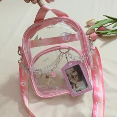 Material: PVC Size: 24.5 x 6 x 18 cm Basic Strap length: 120 cm (You can adjust it for sling bag/backpack) Printed strap length: 120 cm (You can adjust it for sling bag/backpack) Zip: ykk metal You will get: 1. Clear Cross Bag with chain 2. PC holder 3. 1 PC (random member) 4. Basic strap 5. Printed Strap (If you choose printed strap variant). Pink Shoulder Bag With Clear Strap For School, Clear School Shoulder Bag With Adjustable Strap, Concert Bag, Pc Holder, Concert Bags, Heart Shaped Bag, Guts Tour, Dumpling Bag, Kpop Edits