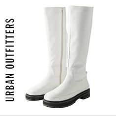 Urban Outfitters Lacey Tall Boots In White Step Onto The Scene In The Futuristic Lacey Boot By Urban Outfitters, Designed With A Tall Shaft In Allover Faux Leather. Complete With A Lightly-Treaded Rubber-Foam Sole And An Inner Zip Closure. New Without Box, Factory Sample** Still Has Original Interior Filler, Never Worn Size 8 Women’s True To Size Any Questions? Just Ask! Additional Discounts On Bundles! Short Heeled Boots, Urban Outfitters Boots, Red Heel Boots, Zodiac Boots, White Leather Boots, Metallic Boots, Urban Outfitters Shoes, Thigh High Boots Heels, Black Platform Boots