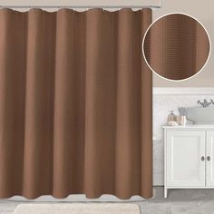 a brown shower curtain in a bathroom