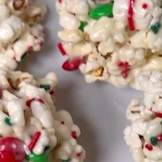 white chocolate popcorn with candy canes and candies on it's side, ready to be eaten