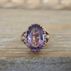 Antique Victorian Amethyst Ring in Rose Yellow Gold | 1800's Statement Ring This gorgeous ring is an 1800's Victorian estate find fashioned from solid 10k gold. It's my favorite color gold which is a combination of rose and yellow. Beautiful mounting holding an oval cut amethyst. This natural gemstone has medium color. It measures approx. 16.4 x 12.3 mm. This ring has lovely work to the sides.  MEASUREMENTS: Face Measurement- 16.4 x 12.3mm Height -5.2 mm  Size - 6 and this can be resized by your jeweler or by ours for an additional fee Weighs - 4.47 grams Markings/Stamps - 10 in a circle (see photo) Condition- Very Good commensurate with age of this piece. Note in the video there is some minor surface wear on the amethyst as expected in a piece of this age.  Dating - Late 1800's ✦ Ring Res Luxury Yellow Gold Victorian Amethyst Ring, Antique 14k Gold Amethyst Ring, Victorian Oval Amethyst Ring With 17 Jewels, Victorian 14k Amethyst Oval Ring, Victorian Style Purple Ring With Center Stone, Victorian Purple Ring With Center Stone, Victorian 14k Stamped Oval Amethyst Ring, Victorian Oval Amethyst Ring Stamped 14k, Victorian Oval Amethyst Ring For Anniversary