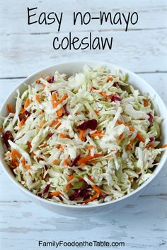 a white bowl filled with coleslaw and carrots