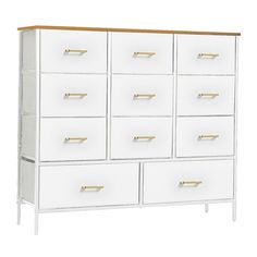 a white dresser with gold handles and drawers