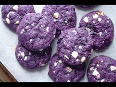 purple cookies with white sprinkles on top