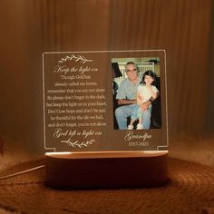 an illuminated photo frame with the words, i love you to the moon and back