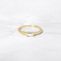 Lori Baguette Ring – Sami Jewels Minimalist Everyday Rings With Baguette Diamonds, Everyday Minimalist Baguette Diamond Rings, Classic Everyday Yellow Gold Crystal Ring, Everyday Classic Yellow Gold Crystal Ring, Minimalist Everyday Stackable Rings With Baguette Cut, Everyday Minimalist Stackable Rings With Baguette Cut, Everyday Minimalist Baguette Cut Stackable Rings, Everyday Minimalist Stackable Rings Baguette Cut, Dainty Emerald Cut Rings For Everyday