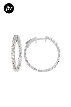 0.50ctw round white diamond, rhodium over sterling silver inside-out hoop earrings. Measures approximately 1"L x 1/16"W and have hinged with notched post backings. Classic Round Hoop Earrings With Diamond Accents, Sterling Silver Round Channel Set Diamond Earrings, White Gold Hoop Earrings With Prong Setting, Sterling Silver Brilliant Cut Round Hoop Earrings, Sterling Silver Brilliant Cut Hoop Earrings, Round Hoop Earrings With Pave Setting For Anniversary, Sterling Silver Hoop Earrings With Pave Setting, White Gold Hoop Earrings With Diamond Accents, Fine Jewelry Round Hoop Earrings With Prong Setting