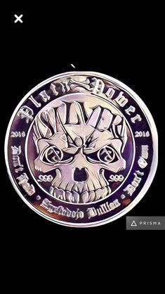 an image of a metal coin with skulls on the front and sides, all in different colors