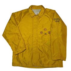 "- Large (please check measurements below)   - Mustard yellow nylon shimmer outer with a blue and white striped lining   - Embroidered 'Varsity Club' on left sleeve and sports activities with a mini logo on the left chest   - Yellow enamelled poppers on placket - Full zip fastening with high quality RiRi zipper   - c 1980s   - Great condition   - Couple small marks on the back and a few on the lining but barely noticeable    - Only showing minor signs of general wear Pit to pit 25.5\"   Neck to hem 30\"   Pit to cuff 21.5\"" Casual Yellow Outerwear For College, Retro Yellow Windbreaker For Fall, Yellow Varsity Outerwear For College, Retro Yellow Windbreaker For Spring, 90s Style Yellow Windbreaker For Streetwear, Yellow Long Sleeve Varsity Jacket, Yellow Long Sleeve Varsity Outerwear, Retro Yellow Windbreaker For Streetwear, Yellow Retro Windbreaker For Streetwear