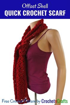 a crochet scarf is shown on a mannequin