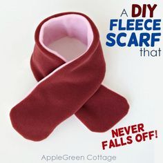 an advertisement for a flee scarf that is red and has a pink ribbon on it