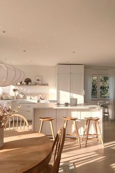 the kitchen is clean and ready to be used as a dining room or living room