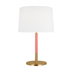 a pink and gold table lamp with a white shade on the top, against a white background