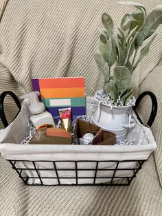 Metal basket 11 x 8 x 6.5 lines with cloth and filled with a variety of items sure to bring a smile to all who receive it. Included: Bath & Body Brightest Bloom scent  14.5oz candle, 8.75oz Brightest Bloom gentle foaming hand soap, 1oz Brightest Bloom shea butter hand cream,Butterfly Wallflower fragrance holder with Brightest Bloom scent, multi color journal with lined pages, metal canister with leaf plant decor.  Comes wrapped in clear cellophane with a raffia ribbon bow. Color Journal, Cream Butterfly, Kitchen Basket, Raffia Ribbon, Metal Canisters, Coloring Journal, Shea Butter Hand Cream, Kitchen Baskets, Leaf Plant