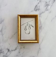 an image of a framed artwork on a marble wall with gold frame and white marble flooring