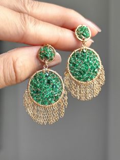 These natural mini emeralds have a very pure color. I try to use them as much as possible without adding any other stones, just pairing them with lightweight gold chain tassels to make them look simple and sophisticated. ●natural emerald ●seed beads ●14k gold filled ●total length: 41mm ● weight：2.6g Welcome to visit my Jewelry store: https://www.etsy.com/shop/Ukuly 🌸The delivery time to Most regions of North America, Australia and Europe is usually about 10-15 days. Buyers from Brazil, South Korea, and Indonesia, please provide me with your tax number through messages or notes for smooth shipment. Thank you. 🌸Please let me know your phone number when you place an order. It will be used for shipping label only. 🌸I will pack the goods very carefully and beautifully. They can be used as gi Green Pierced Chandelier Earrings For Party, Green Chandelier Pierced Earrings For Party, Green Dangle Hoop Earrings For Celebration, Green Dangle Earrings For Celebration, Handmade Green Tassel Earrings For Party, Green Hoop Jewelry For Party, Handmade Green Chandelier Earrings For Celebration, Green Chandelier Earrings As Gift, Green Chandelier Earrings For Celebration