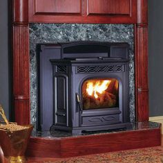 a wood burning fireplace in a living room