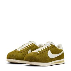 One word: tradition. From heritage running to fashion phenom, its retro appeal, sponge-soft midsole and see-saw detailing deliver decade after decade. This Nike Cortez combines durable suede and easy-to-style colors for a vintage vibe. Features: Padded, low-cut collar looks sleek and feels great. Foam midsole with iconic wedge insert delivers comfort from the get-go. Rubber sole with herringbone pattern gives you plenty of traction. Details: Leather Swoosh. Upper: Suede. Midsole/Outsole: Foam. C Bill Bowerman, Cortez Shoes, Green Sneakers, Sneaker Men, Heritage Fashion, Nike Cortez, Nike Cortez Sneaker, Nike Sportswear, Sneaker Head