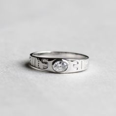 >Oval cubic zirconia bezel set on sterling silver band . >Sterling silver is an almost pure metal made from 92.5% Silver. >Approx. 4mm band width face and 2.5mm back >cubic zirconia; 3.5mm x 5mm FREE SHIPPING USA- All of our jewelry will arrive in custom packaging ready for gift giving. CARE: To prolong the color and shine of your jewelry, avoid contact with perfume, lotion, and water. Store in a bag or jewelry box. SATISFACTION GUARANTEED All pieces are carefully examined prior to d Boyfriend Ring, Silver Oval Ring, Ring For Boyfriend, Perfume Lotion, Tiara Ring, Marquise Ring, Oval Ring, Ring Stacking, Oval Rings