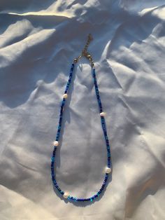 beautiful deep blue beads with freshwater pearls ⭐️💙 All necklaces are about 16-18 inches (unless specified to be longer or shorter) & comes with an attached, adjustable silver chain! :) So you can adjust it to your liking (longer or shorter)🤍 Blue Pearl Necklaces With Polished Beads, Adjustable Blue Pearl Necklace With Polished Beads, Adjustable Polished Blue Pearl Necklace, Blue Pearl Necklace With Polished Beads, Blue Pearl Necklaces With Colorful Beads, Blue Beaded Pearl Necklace With Round Beads, Blue Pearl Beaded Necklace With Polished Beads, Blue Pearl Necklace With Colorful Beads, Handmade Blue Pearl Necklace With Round Beads