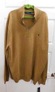 Polo Ralph Lauren NEW WITH TAG! 100% Guaranteed Authentic. Size: XXL.  Beige brown knit pullover sweater. 100% Cotton. 1/4 zip top. Casual Brown Half-zip Outerwear, Brown Half-zip Top For Winter, Casual Brown Long Sleeve Polo Sweater, Brown Long Sleeve Polo Sweater, Casual Brown Half-zip Top, Brown Long Sleeve Polo Sweater With Ribbed Collar, Brown Long Sleeve Polo Sweater For Fall, Brown Knit Polo Sweater, Brown Knit Sweater