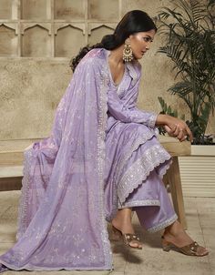 Designer Function Wear Heavy Salwar Suit Collection Processing Time : 20-25 Business Days Work : Embroidery Work Fabric:Top : Chinon Bottom : Santoon Dupatta : Chinon Color:Top : Lavender Bottom : Lavender Dupatta : Lavender Note : Properly care for your clothing by following care instructions Lilac Sharara Suit, Lavendar Dress Outfits Indian, Lilac Shalwar Kameez, Lavender Desi Outfit, Lavender Indian Dress, Light Purple Punjabi Suit, Lavender Dress Indian, Lavender Suits For Women Indian, Lavender Indian Outfit