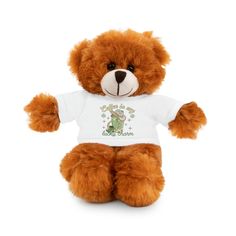 a brown teddy bear wearing a t - shirt