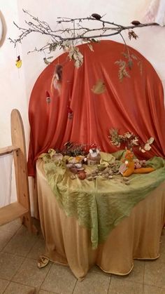 the table is covered with an orange cloth