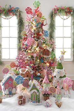 a christmas tree decorated with candy and lollipops