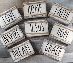 six wooden signs that say love, home, faith, jesus, hope and grace