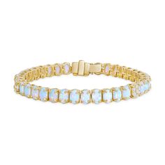 This Elegant Opal and Diamond Solid Gold Bracelet is a simple, yet unique piece that is the perfect addition for everyone's fine jewelry collection. Each Opal and Diamond stone is carefully placed on the Solid Gold setting to create a beautiful everlasting shine. Its sparkle and delicate design will always be effortlessly flattering. This gold bracelet is a great piece for any occasion - Birthday, Mother's day, Anniversary, or Graduation! It is an exquisite piece for a loved one to always cheris Adjustable Oval Jubilee Bracelet, Adjustable Oval Bracelet With Stones, Adjustable Oval Bracelets With Stones, Diamond Gold Bracelet, Gold Arm Band, Bracelet With Diamonds, Solid Gold Bracelet, Gold Armband, Birthstone Bracelet