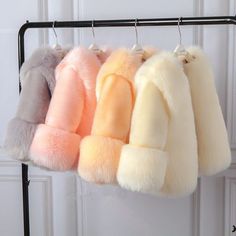 Spring Fluffy Faux Fur Coat, Trendy Fluffy Fur Coat For Fall, Fluffy Faux Fur Outerwear For Spring, Trendy Faux Fur Coat With Trim, Spring Faux Fur Coat With Faux Fur Trim, Trendy Fluffy Long Sleeve Fur Coat, Chic Fluffy Fur Coat, Trendy Long Sleeve Fluffy Fur Coat, Chic Fluffy Fur Coat For Spring