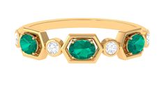 Product Details This elegant Emerald Band Ring is a perfect choice for your sweetheart. Adorned with Oval Cut Emerald and Diamond on Classic Band glams up your look. Product Information SKU SHP-RINGS032225952 Weight 2.20 gm (Approximate) EMERALD INFORMATION No.of Stones 3 Pieces Total Weight 0.43 Carat (Approximate) Dimension(approx) Oval-3X4 mm-3 Pcs Color Green Cut Brilliant Shape Oval Setting Type Other-Setting Quality Grade AAA DIAMOND INFORMATION No.of Stones 4 Pieces Total Weight 0.19 Cara Elegant Green Octagon Diamond Ring, Green Halo Diamond Ring For Anniversary, Green Diamond Halo Ring In Round Cut, Green Emerald Ring With Round Diamond Band, Green Emerald Diamond Ring With Halo, Elegant Green Emerald Ring With Round Band, Green Emerald Halo Diamond Ring, Formal Green Emerald Ring With Halo Design, Green Emerald Ring With Halo Style Fine Jewelry