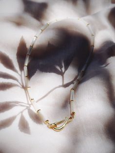 This white mother of pearl pikake shell necklace evokes visions of Hawaii's flower leis and reflect Hawaii's natural abundance. This unique beauty is ready for you and your tropical escape. ✦ DETAILS ✦✧ Name: Mau loa (maow LOah) - always and forever.✧ White Mother of Pearl beads.✧ 14kt Gold Filled clasp and beads.✧ All Ke Aloha Jewelry pieces come packaged thoughtfully, beautifully, and ready for gift giving. Delicate White Mother Of Pearl Jewelry, Delicate White Mother Of Pearl Necklace, Spiritual White Mother Of Pearl Jewelry, Elegant White Shell Necklace With Natural Stones, Spiritual White Shell Necklace, White Mother Of Pearl Spiritual Necklace, White Mother Of Pearl Necklace With Natural Stones, White Single Strand Mother Of Pearl Beaded Necklaces, White Single Strand Mother Of Pearl Beaded Necklace